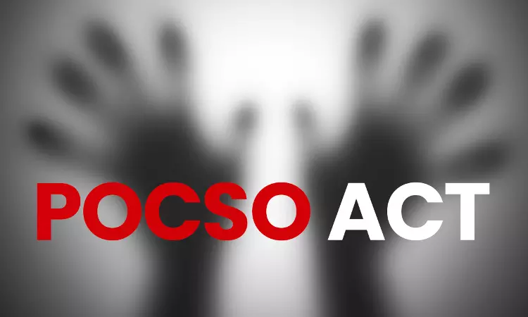 POCSO Act text with blurred hands symbolizing protection and legal action against child abuse.